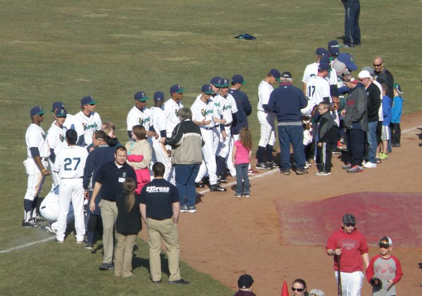 Kernels sign postgame autographs