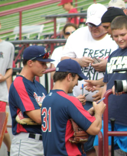 Max Kepler and Caleb Brewer sign some autographs 