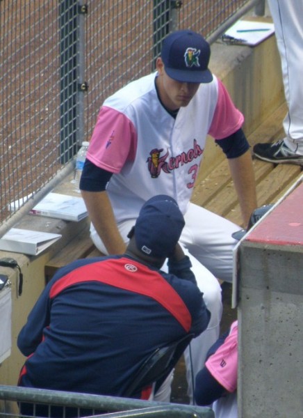 Aaron Slegers having a between-innings conversation with pitching coach Ivan Arteaga