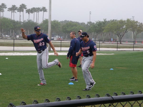 Chad Christensen & Jason Kanzler going through early morning stretching exercises