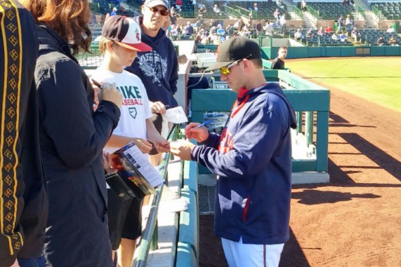 Mitch Garver doing the autograph thing before Thursday;s game.