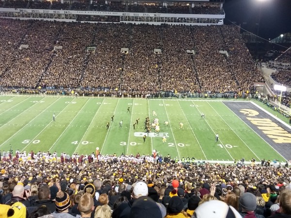 "Blackout" crowd watches the first play from scrimmage of Iowa vs Minnesota (technically, the Gophers got called for a procedure penalty before the snap, so this play never happened)