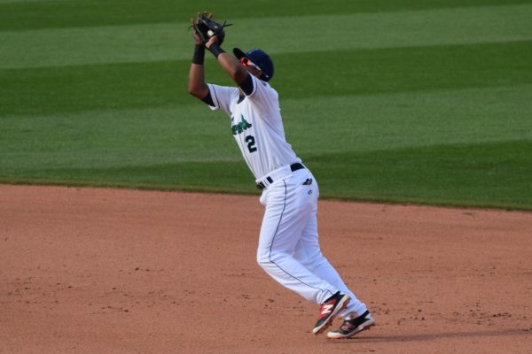 Luis Arraez squeezes a pop fly