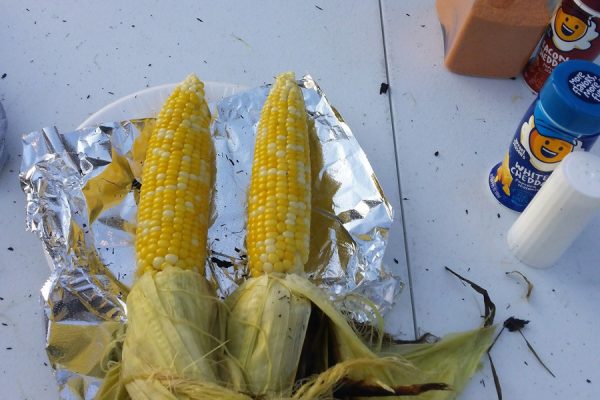 I confess that I did not just remain in my seat throughout the game. In addition to an occasional trip to the concourse for a margarita refill, I also found the sweet corn stand. This stuff might be just about the best thing about summer in Iowa that's not related to baseball, so I couldn't pass up the chance to combine them at the same time.