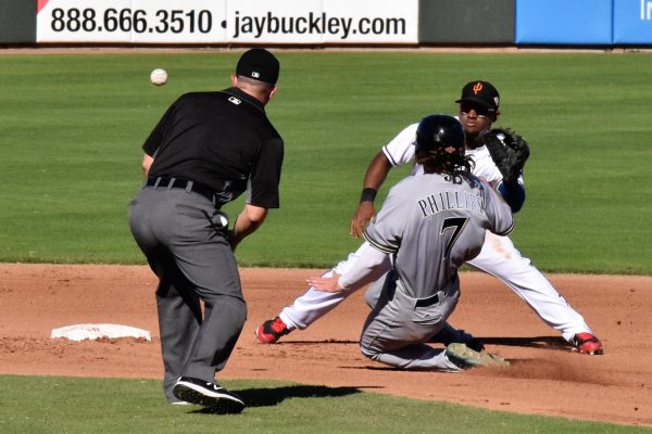 Andy Ibanez (Rangers) awaits a throw from Garver as Brett Phillips (Brewers) slides. No, the picture doesn't involve any Twins prospects, but I just really liked the way the picture turned out! :)