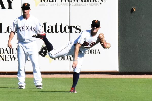 Tanner English throwing a runner out at second base